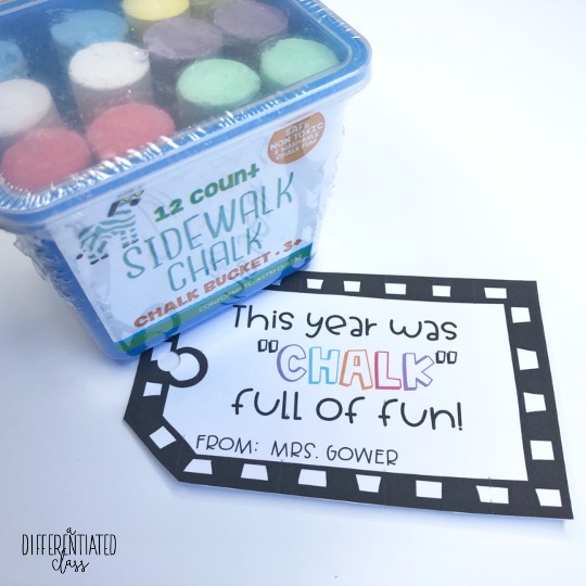 Tub of sidewalk chalk with gift tag that says, "This year was chalk full of fun!"
